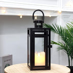 TRIROCKS Metal Candle Lantern 12'' High Decorative Outdoor Lantern Hanging Lantern with Tempered Glass for Christmas Home Decor Living Room Parties Events Tabletop Indoors Outdoors (Black Matte)