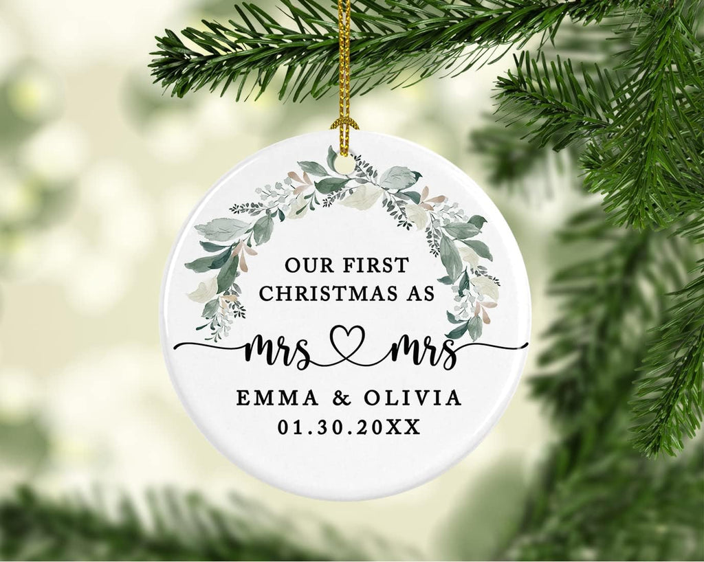 Andaz Press Personalized Our First Christmas As Mrs. & Mrs. Christmas Ornaments 2025 Foliage Wreath 2.8" Round Porcelain Ceramic Lesbian Christmas Ornament Married Couple Gay Women Newlyweds 1-Pack