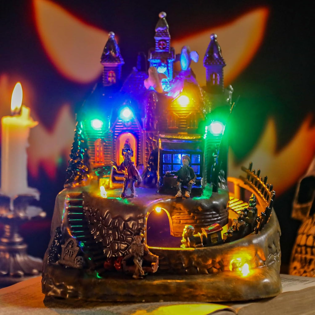 DREAM GARDEN Halloween Village Collection, Lighted Spooky Haunted House with Animated Train and Scary Sound Resin Spooky Town with Skull, Pumpkin, Ghost for Holiday Party Tabletop Decor