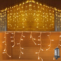 YASENN 300Led Icicle Style String Lights 29.5FT,Update Connectable 8 Lighting Modes with Timer Icicle Lights for Home Garden Outdoor Indoor Eave Decor (Warm White LED White Cable)