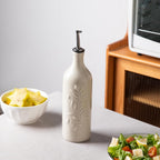 Sweejar Large Olive Oil Dispenser Bottle with Spout, 24 Oz Ceramic Oil Dispenser for Kitchen, Relief Opaque Oil Cruet, Oil Container for Cooking, EVOO, Avocado Oil, Vinegar, Pack of 1 (Beige)