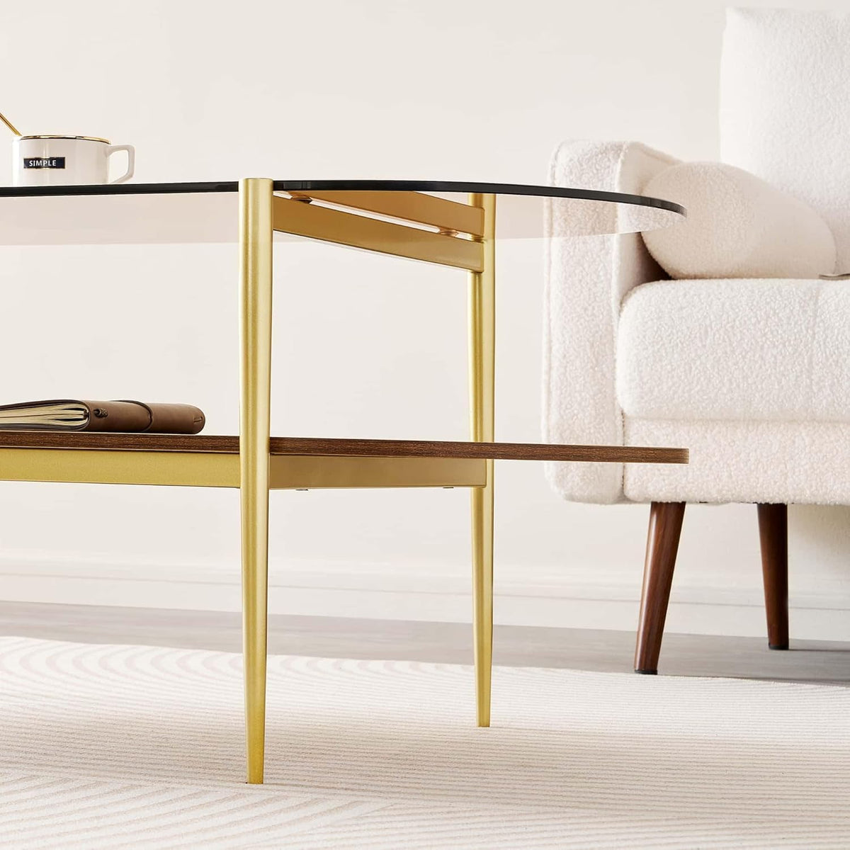 Oval Glass Coffee Table, Mid-Century Modern Design, L41 x W21 x H17 inch, for Living Room, 2-Tier Structure, Amber Glass Top and Walnut Finish Wood Shelf, Conical Legs with Gold Finish Frame
