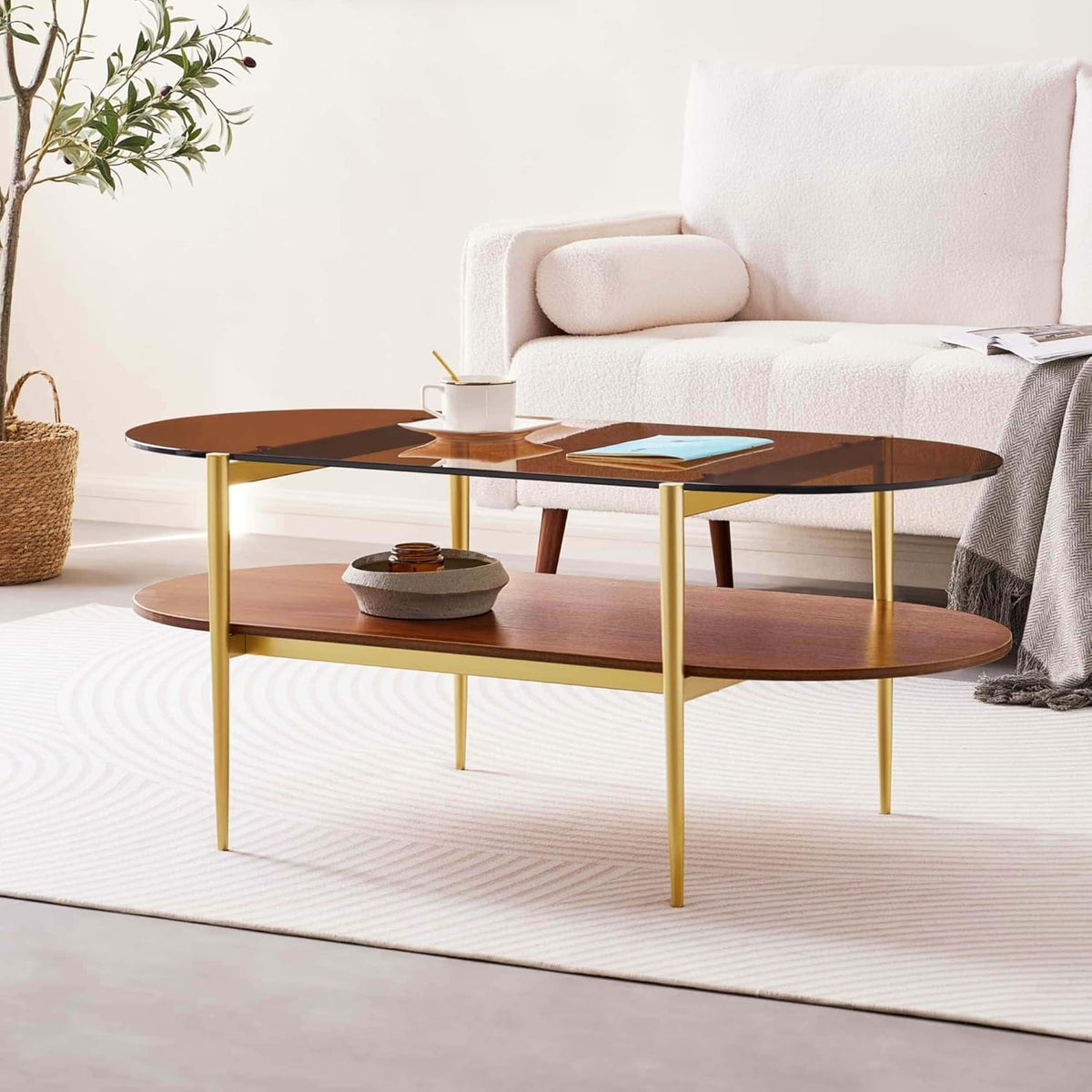 Oval Glass Coffee Table, Mid-Century Modern Design, L41 x W21 x H17 inch, for Living Room, 2-Tier Structure, Amber Glass Top and Walnut Finish Wood Shelf, Conical Legs with Gold Finish Frame