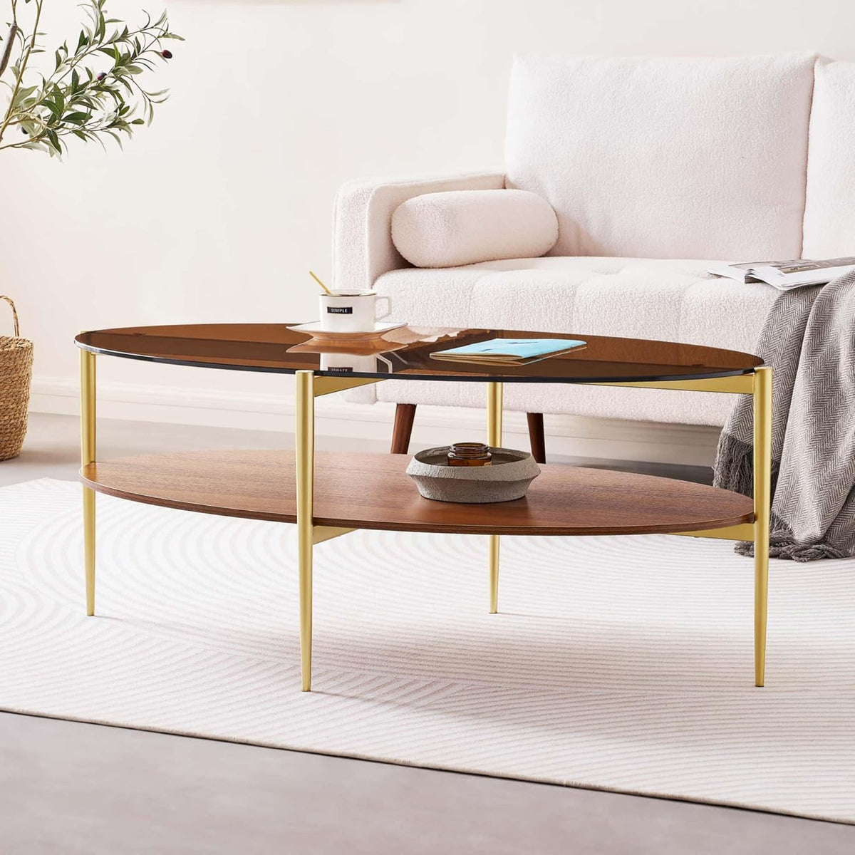 Oval Glass Coffee Table, Mid-Century Modern Design, L43 x W22 x H17 inch, 2-Tier Structure, Olive Shaped Amber Glass Top and Walnut Finish Wood Shelf, Tapered Legs with Gold Finish Frame