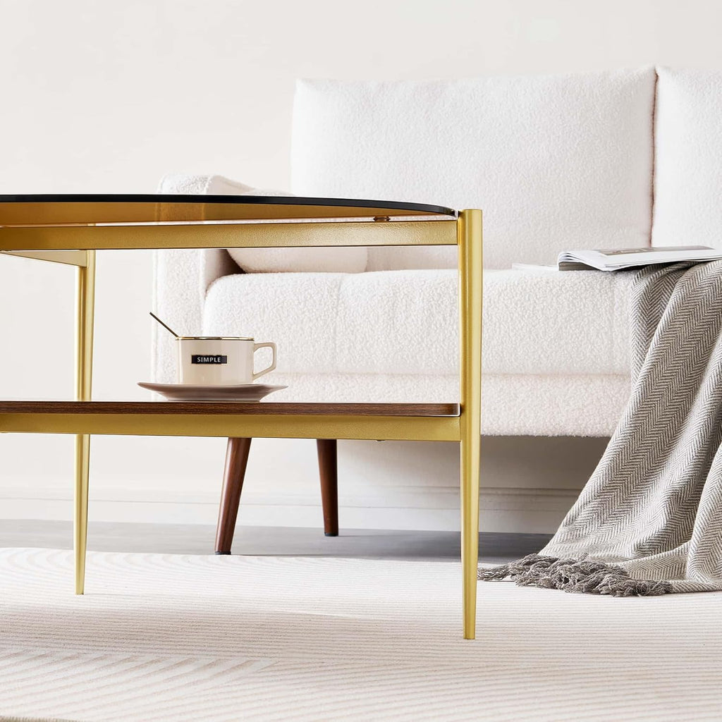 Oval Glass Coffee Table, Mid-Century Modern Design, L43 x W22 x H17 inch, 2-Tier Structure, Olive Shaped Amber Glass Top and Walnut Finish Wood Shelf, Tapered Legs with Gold Finish Frame
