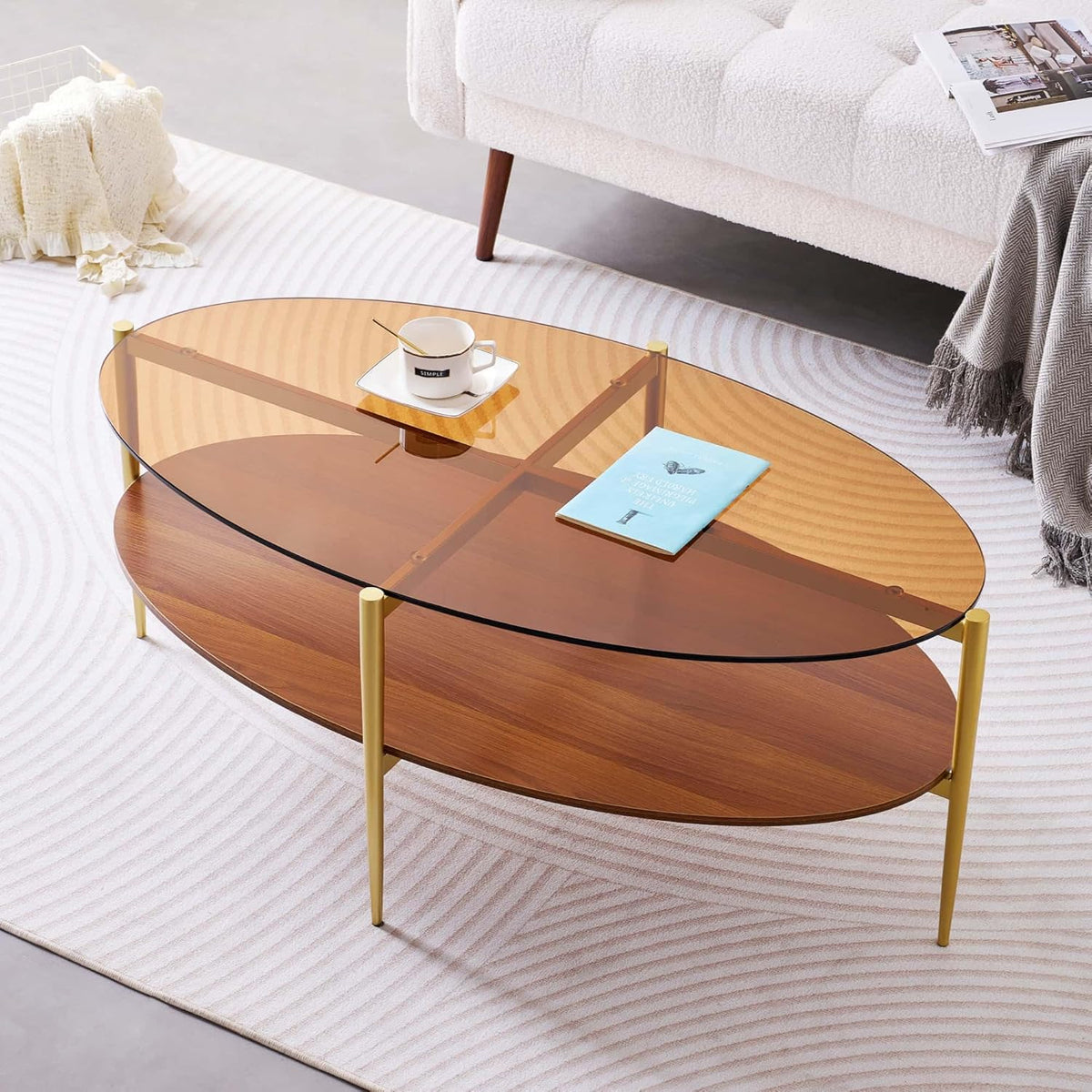 Oval Glass Coffee Table, Mid-Century Modern Design, L43 x W22 x H17 inch, 2-Tier Structure, Olive Shaped Amber Glass Top and Walnut Finish Wood Shelf, Tapered Legs with Gold Finish Frame