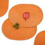AHHFSMEI Placemats Set of 6 for Dining Table Washable Woven Vinyl Non-Slip 18x12 inches Placemat Heat-Resistant Durable Table Mats for Dining Table Easy to Clean(Oval Orange,6)