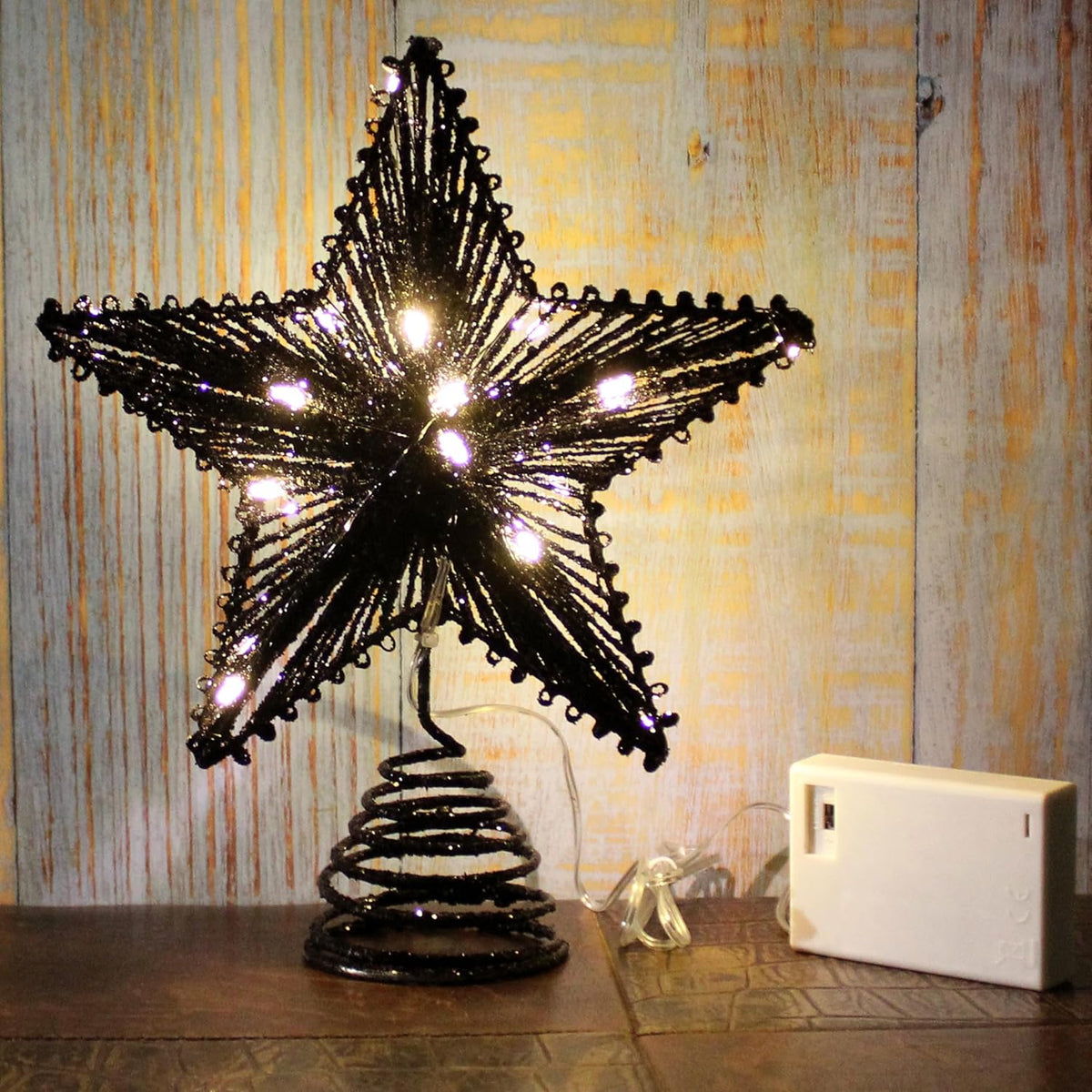 CVHOMEDECO. Tree Top Star with Warm White LED Lights and Timer for Christmas Ornaments and Holiday Seasonal Décor, 8-Inch (Black)