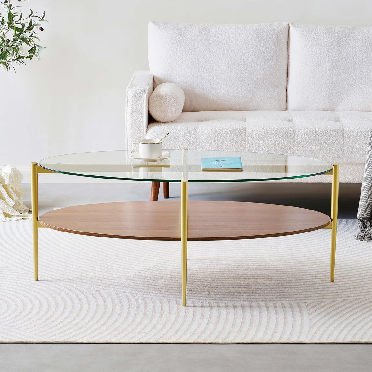 Oval Glass Coffee Table, Mid-Century Modern Design, L43 x W22 x H17 inch, 2-Tier Structure, Olive Shaped Clear Glass Top and Walnut Finish Wood Shelf, Tapered Legs with Gold Finish Frame